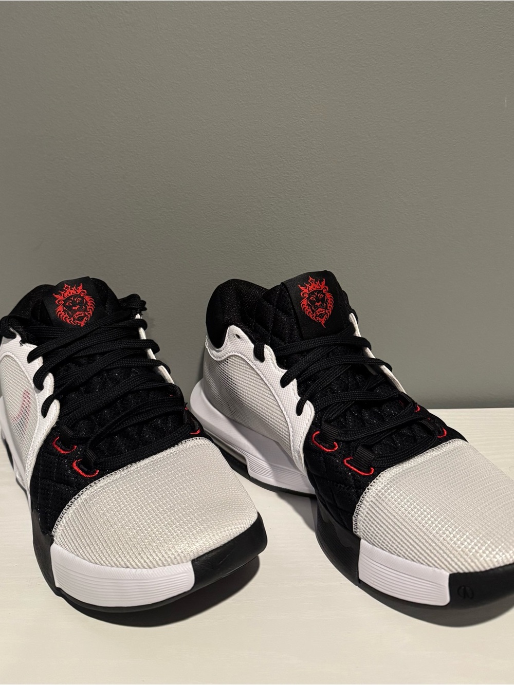 Nike Black and white LeBron Witness VIII Sneakers with Red Accents